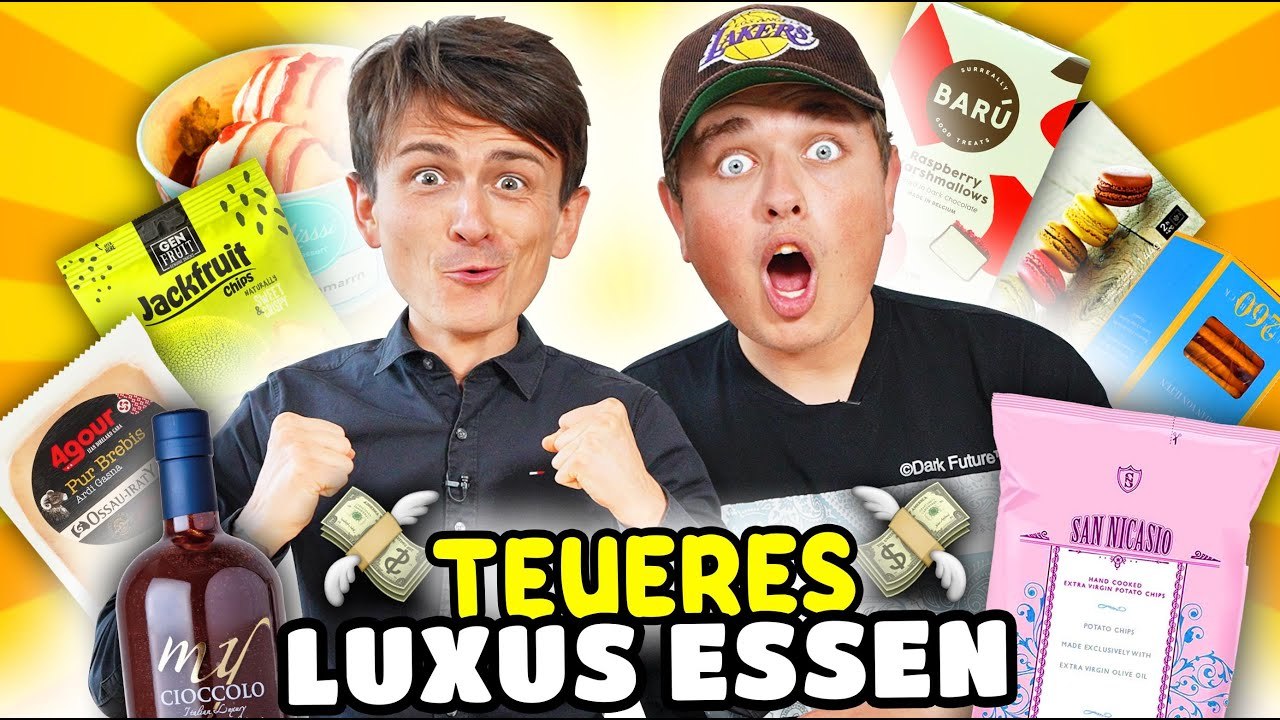Teure feinkost-produkte testen mit smiley: luxus-essen, macarons, käse und sardinen