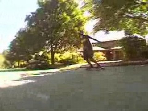 Longboard slides down a hill