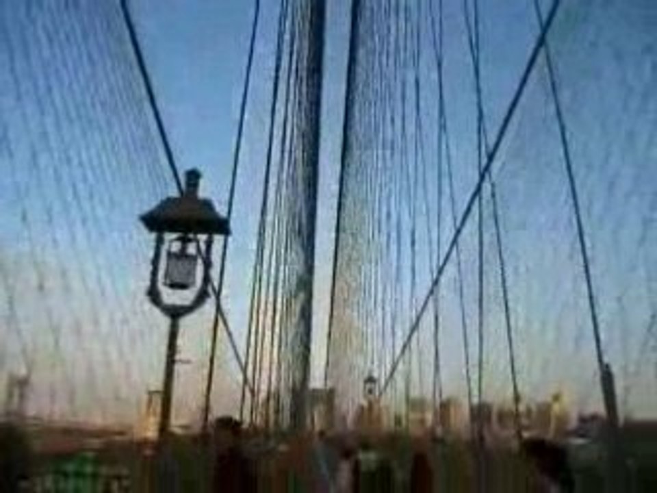Walking Across the Brooklyn Bridge During Sunset