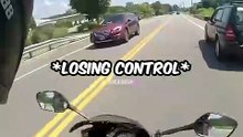 Cop Helps Out Biker
