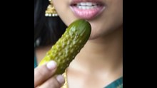 Pirya_biting_green_pickle
