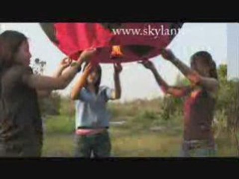 Launch of a Football red black Sky Fire Lantern UFO balloon