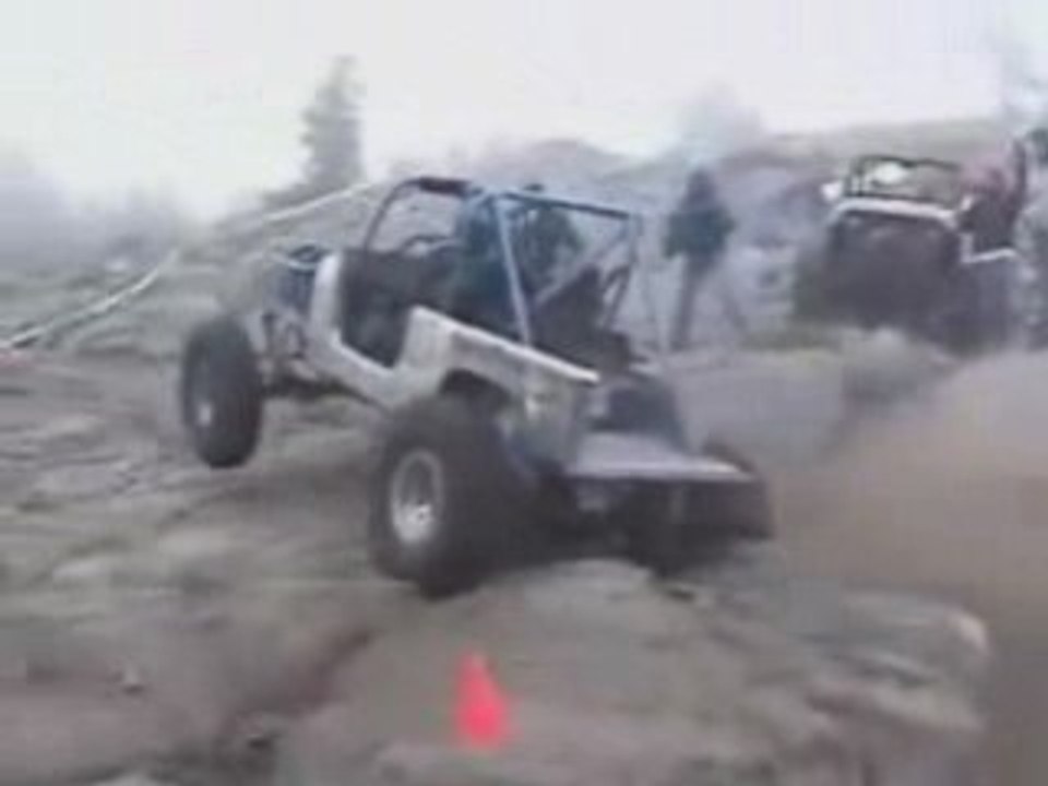 Jeep Climbs Side Of Mountain