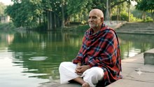 Baba Neem karoli chanting 'Ram Ram' Near a Pond