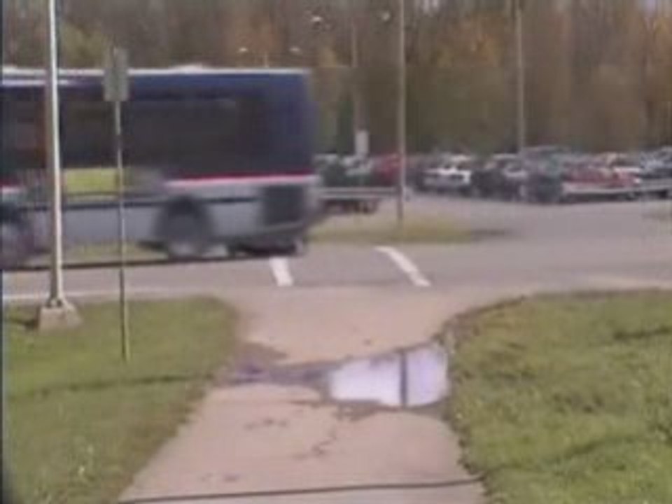 Guy Runs In Front of Bus