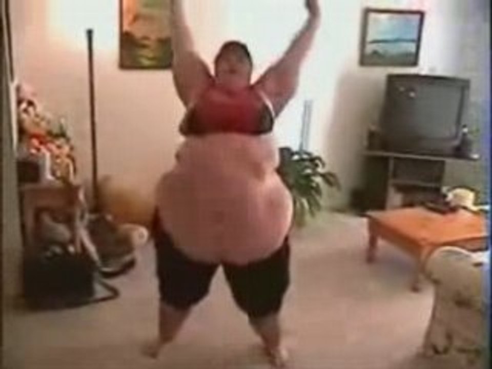 Slightly Overweight Lady Doing Aerobics