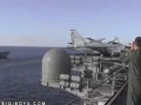 Navy F-14 Tomcat Buzzes Aircraft Carrier