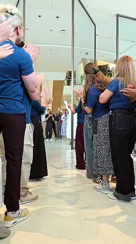 Cheers, applause fill the air as Apple Store welcomes first customers
