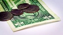 How much money does the average person invest monthly ?