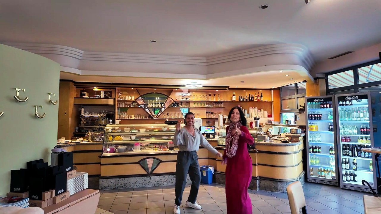 A spontaneous dance interlude with the owner of our favorite ice cream parlor.