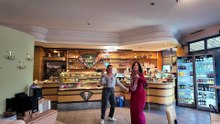 A spontaneous dance interlude with the owner of our favorite ice cream parlor.