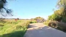 Cyclists enjoy a beautiful new path, showcasing scenic views