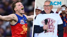 Fans celebrate with premiership winner Brisbane Lions