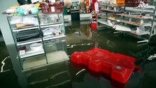 Bangkok residents rush to buy supplies as floods recede