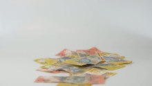What percentage of Americans have over $100,000 in the stock market ?