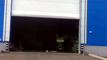 How durable are PVC fabric flexible hangar doors?