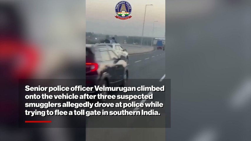Cop clings to speeding SUV as suspected smugglers flee