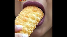 Pirya_biting_fried_enchilada_roll