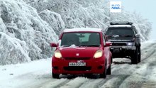 Сильный осенний снегопад парализовал дороги на Дальнем Востоке России