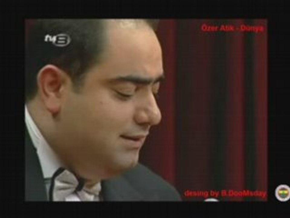 Özer Atik Dünya Dinle