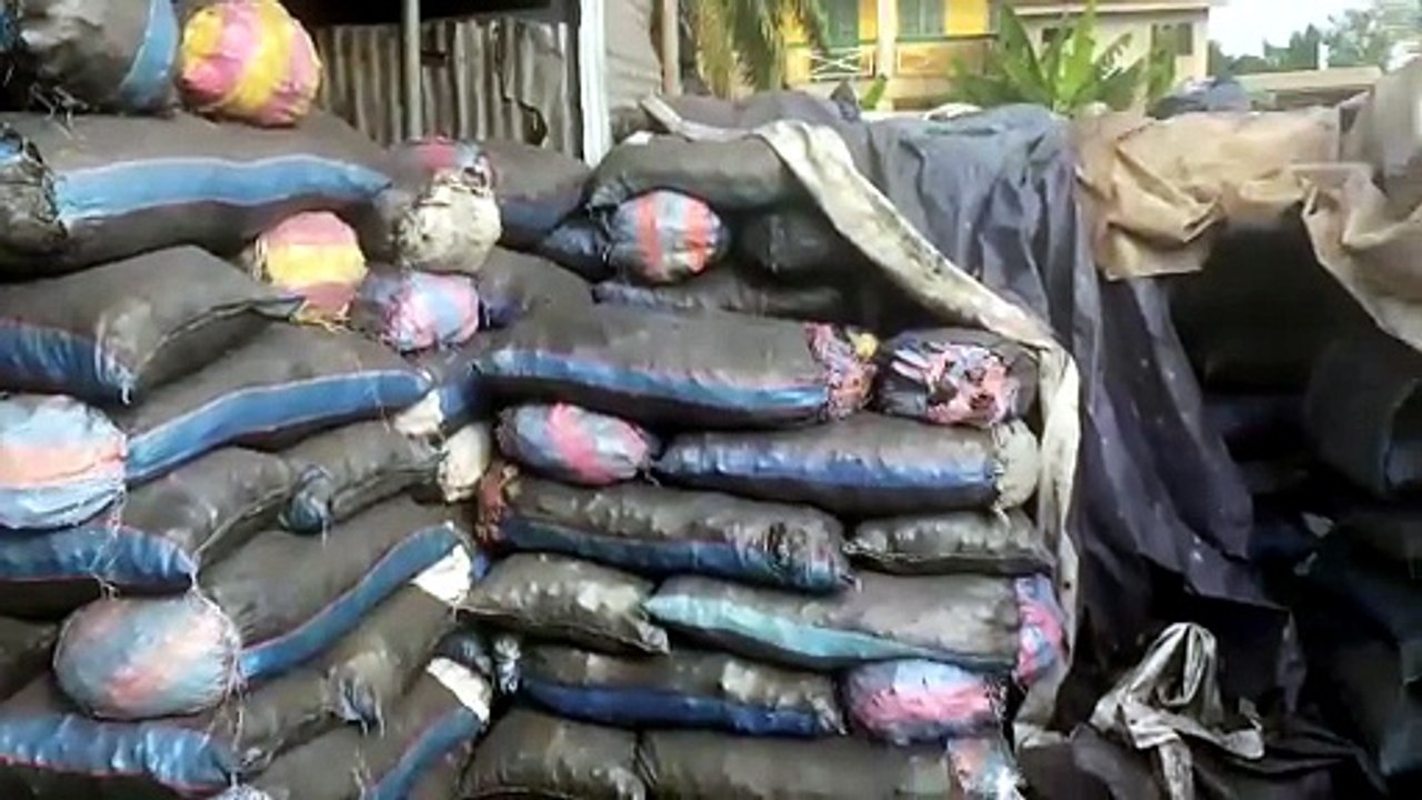 Charcoal Bags Stacked for Sale at Roadside Market Ghana | Daily Hustle ...