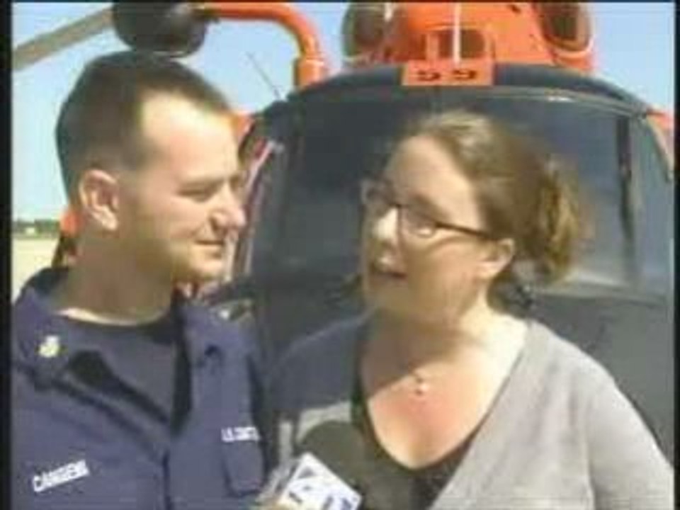 Coast Guardsman Reenlists While Skydiving