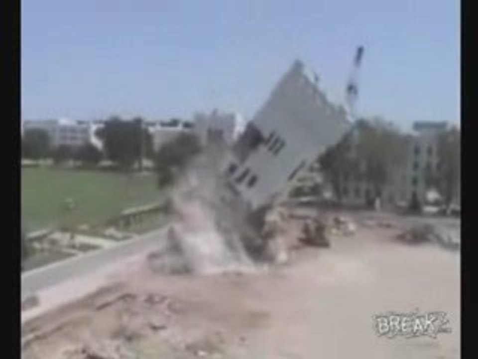 Building Collapses Onto Crane