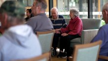 Sisters perform piano to warm reception of dementia patients