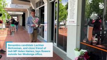 Lachlan McKeeman lays flowers for Helen Haines