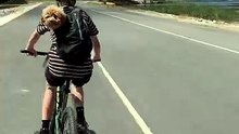An ordinary bicycle picnic transforms into a fun outing for the whole family and their dogs