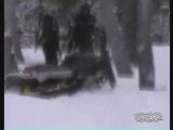 Snowmobiler Cruises Across River