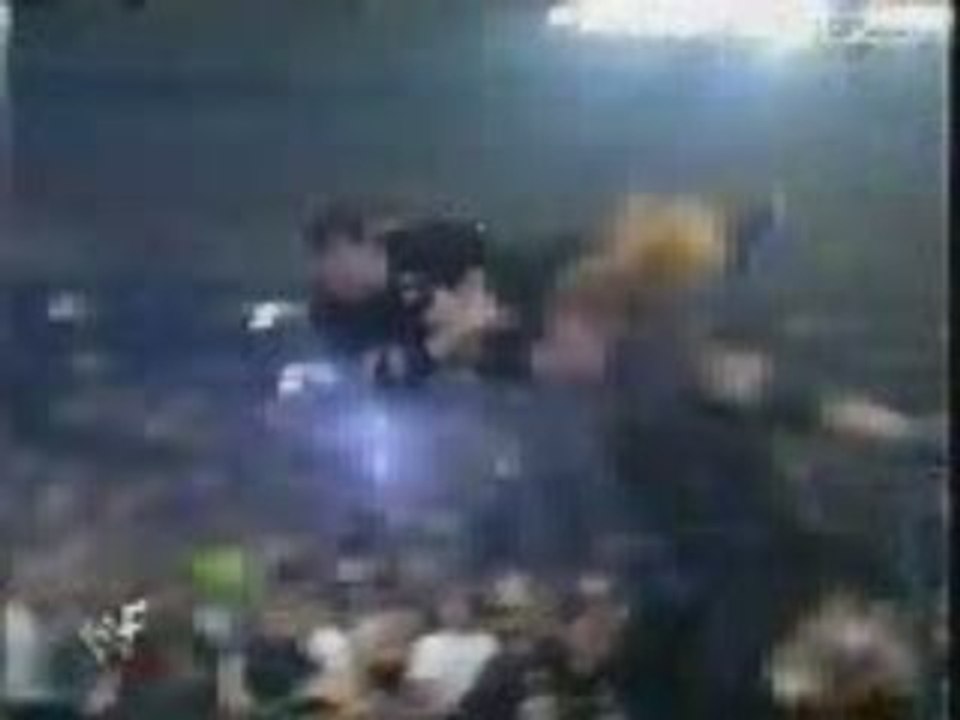 WWF - Undertaker Chokeslams Shane McMahon from top rope Thro