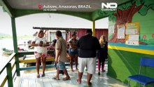 Brasil: filas longas e viagens fluviais marcam voto presidencial decisivo