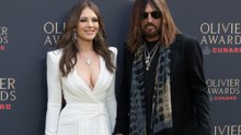 Elizabeth Hurley's relationship with Billy Ray Cyrus 'works very well' because they are both 'empty nesters'