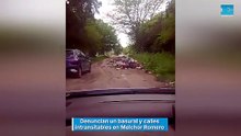 Denuncian un basural y calles intransitables en Melchor Romero