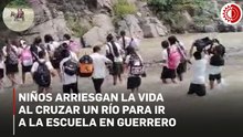 Niños arriesgan la vida al cruzar un río para ir a la escuela en Guerrero