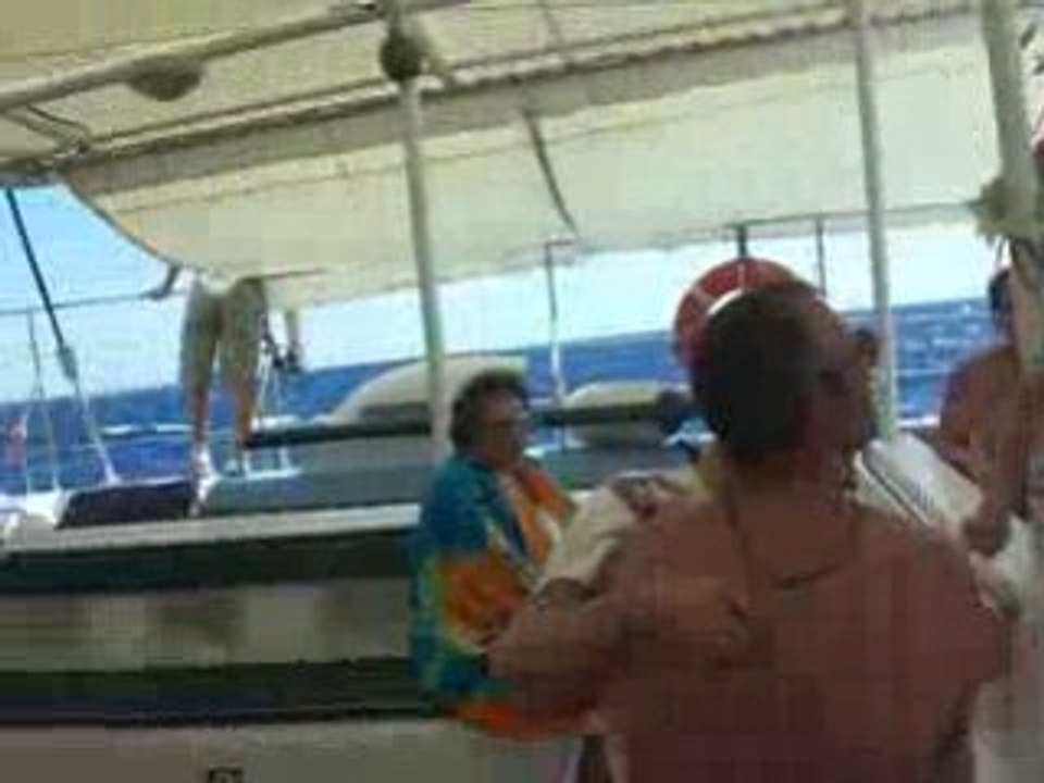 Papa a la barre du maxi catamaran