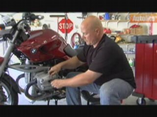 Autolite Motorcyclist changes plugs on a BMW & Harley