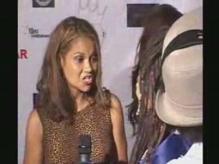 Actress Juliette Fairley chats w/De Veaux @ Poo Bear Party