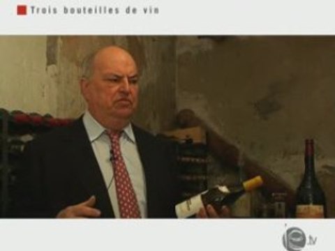 Trois bouteilles de vin aux enchères