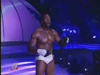 Undertaker play mind games with Booker T