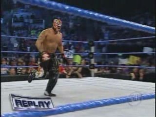 Edge spears the hell of Mysterio