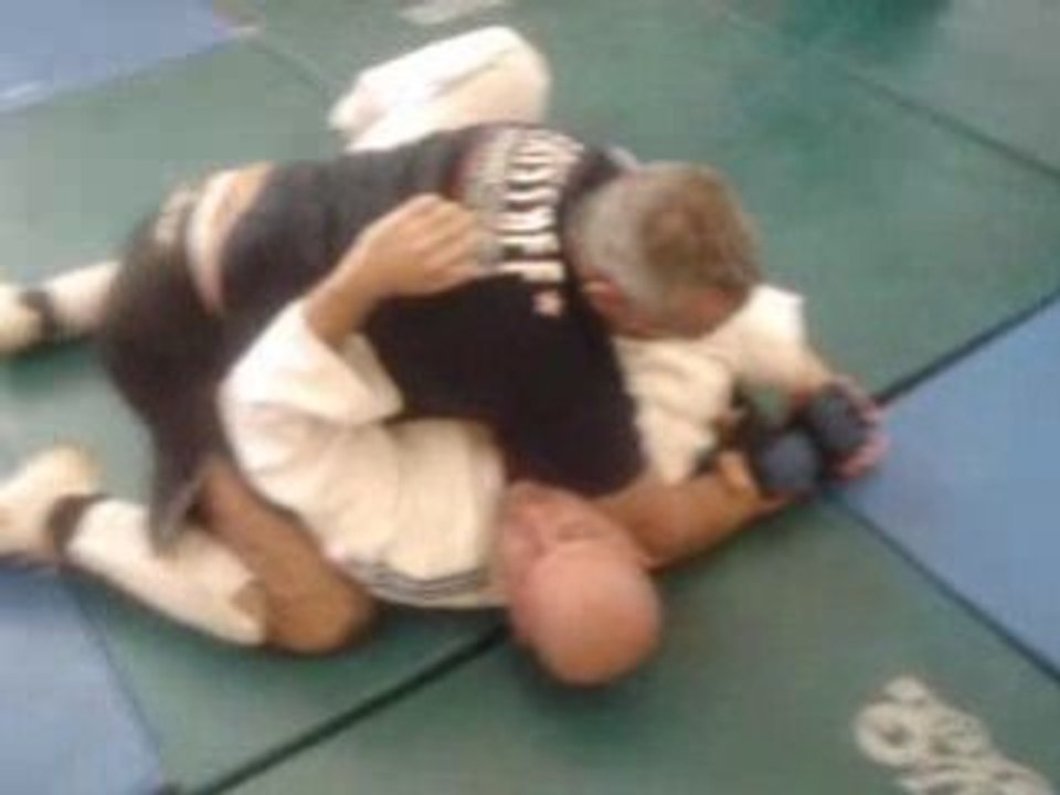 Passage de garde de jambe et clé de bras