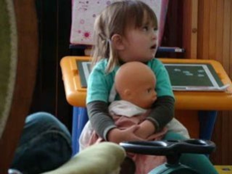 Playing with baby doll