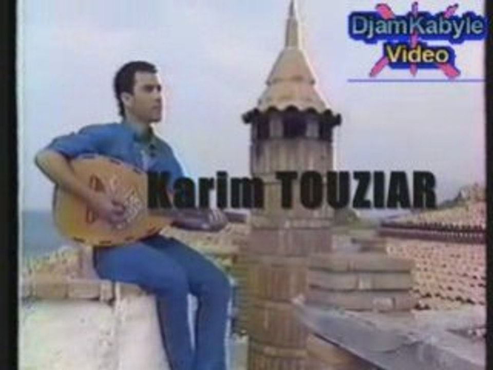 Karim Tizouiar "Athine Iyardjigh" clip Kabyle(1995)