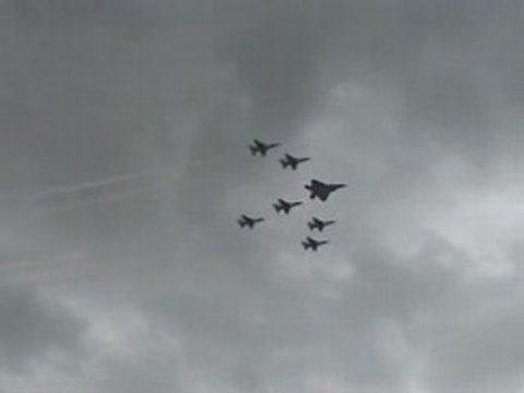 F-22 raptor fly with thunderbirds