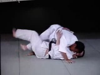 Revers de tori par dessus le visage d'uke