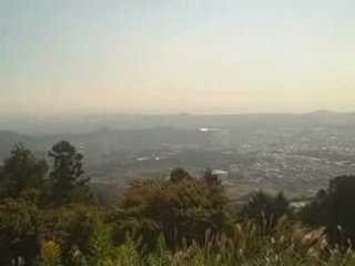 With motorbike in mountains near Tokyo