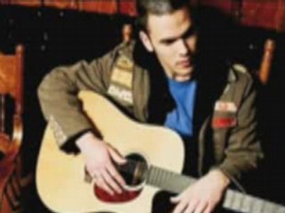 Justin nozuka sitting on the dock of the bay cover