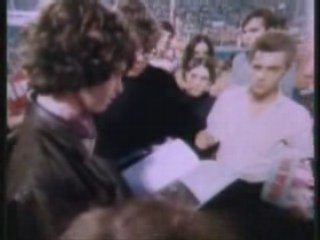 Jim Morrison of The Doors talks with fans
